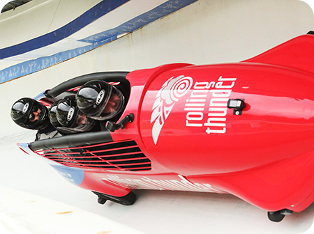 insurance agents go bobsledding in Whistler